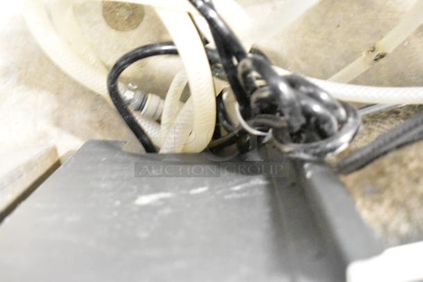 Vero Commercial Countertop Water Dispenser, visible internal hoses and tubing, used condition, brand focus.