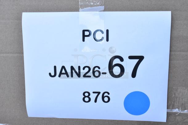 Cardboard box with label reading "PCI JAN26-67 876" and a blue dot sticker. Contains brand new Lancaster Table & Seating chair frames.