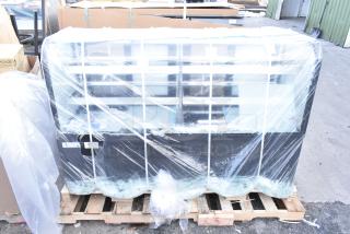 Brand new Avantco 193BC72HCB 72" black refrigerated bakery display case, wrapped, with visible glass damage. 110-120V, 1 phase.
