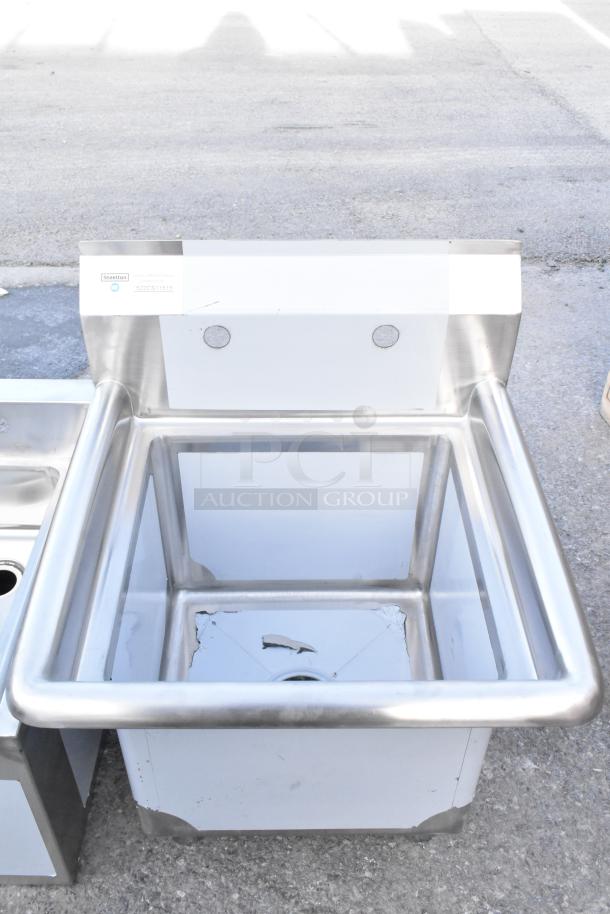 Stainless steel sink with minor scratches, Steeltin brand, model 522CS11515, new condition, visible dent on base.