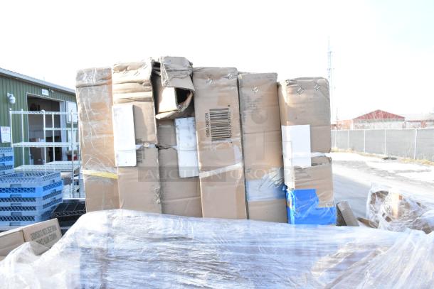 Boxes containing 13 scratch and dent items, including a blue chair, sinks, and pan racks, wrapped in plastic.