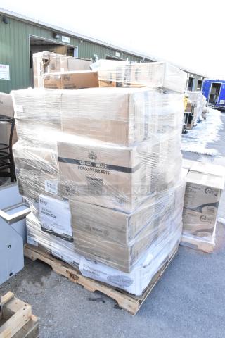 Pallet of new scratch and dent items including boxed paper towels, lids, containers, and gloves, wrapped in plastic.