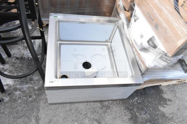 BRAND NEW Regency 600SM242412 stainless steel mop sink, 24"x24"x12" bowl, 16-gauge, with minor scratches, auction tag visible.