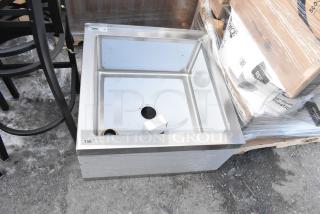 BRAND NEW Regency 600SM242412 stainless steel mop sink, 24"x24"x12" bowl, 16-gauge, with minor scratches, auction tag visible.