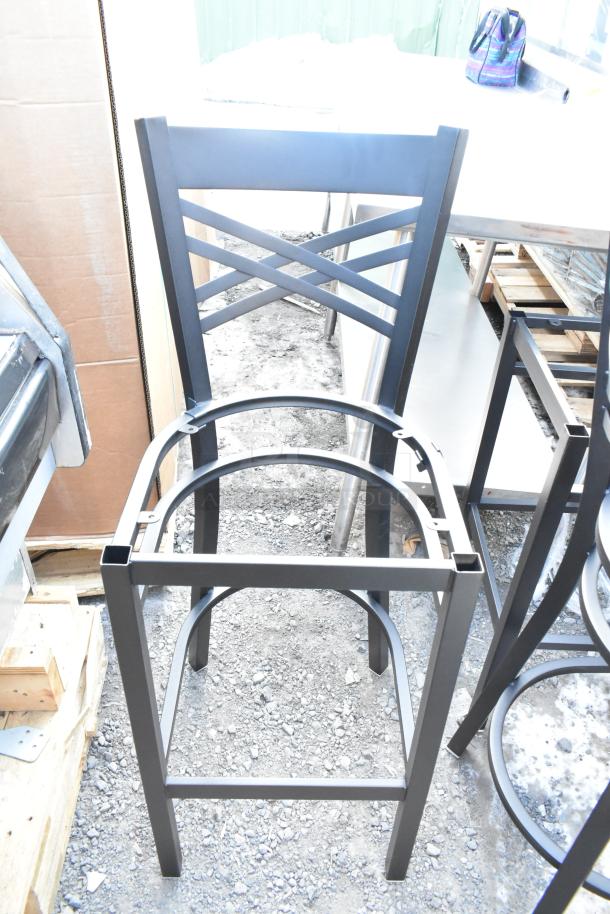 Black metal cross back bar height chair frame, scratch and dent, new condition. No seat included. Auction for six pieces.