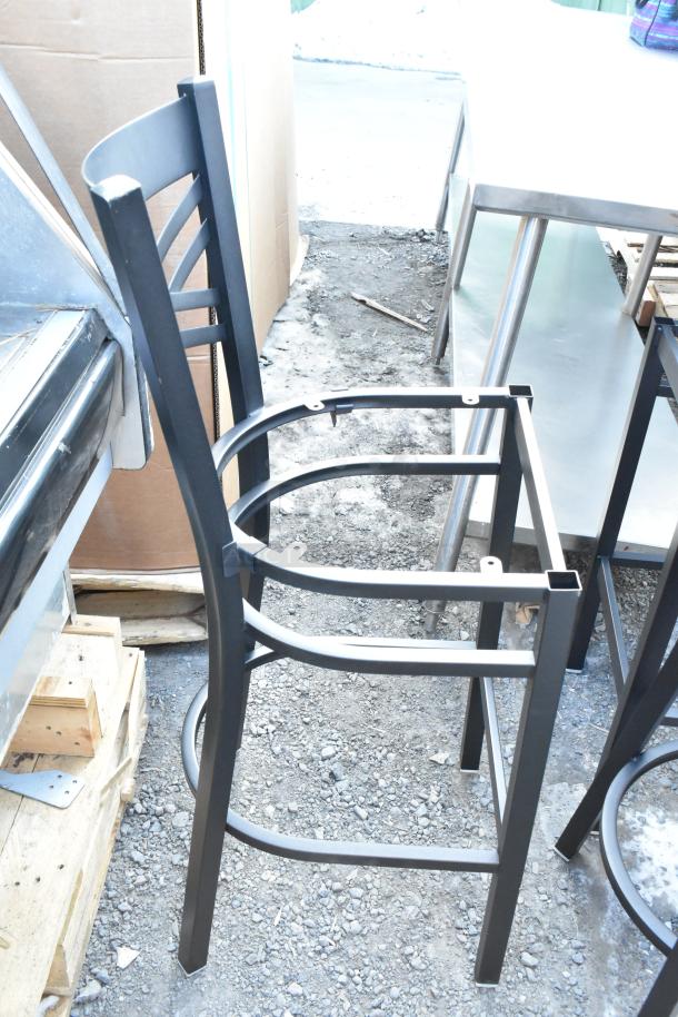 Black metal cross back bar height chair frame, brand new with scratch and dent condition, no seat cushion. Auction item.