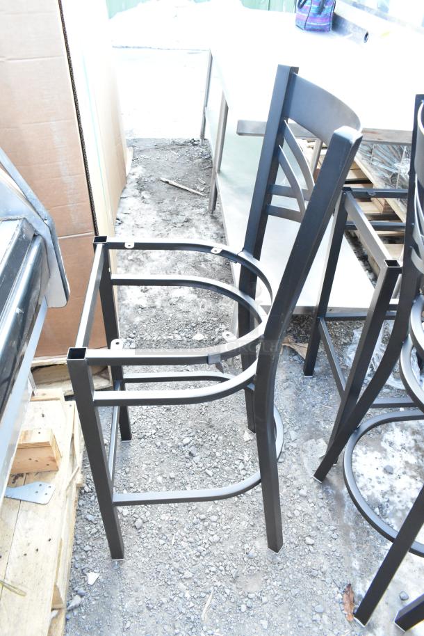 Brand new black metal bar-height chair frame with crossback design. Scratch and dent condition, set of six available.
