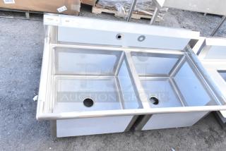 Brand new Regency 600S22424 stainless steel 2-bay sink, no legs. Visible scratch and dent. Markings include model info.