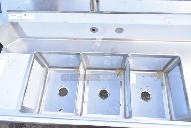 Brand new Regency 600DDTS384RT 16-gauge 7' soiled dish table with 3-compartment sink, right drainboard, no legs, slight scratches.