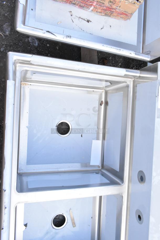 Regency 600S32323 three-compartment 78" stainless sink, scratch and dent, 16-gauge, no legs, 23"x23"x12" bowls.