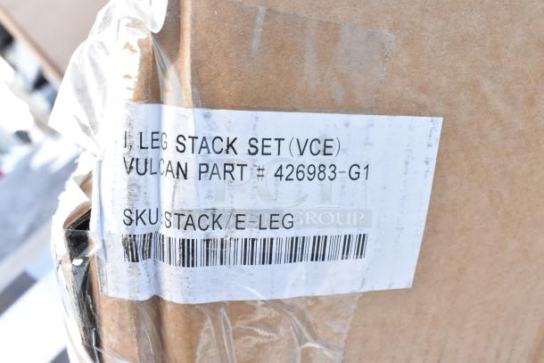 Brand new Vulcan 426983-G1 Leg Stack Set in packaging. Visible label reads "Vulcan Part # 426983-G1" with barcode.