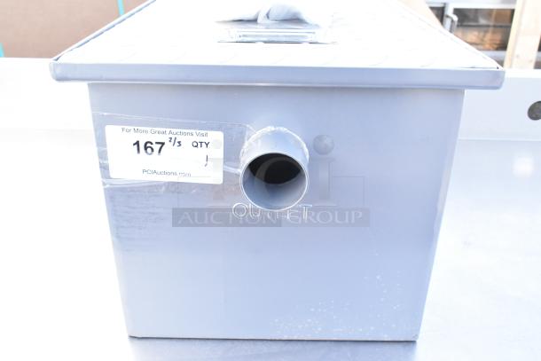 Gray rectangular grease trap with an outlet pipe. Label indicates item number 167. Appears unused.