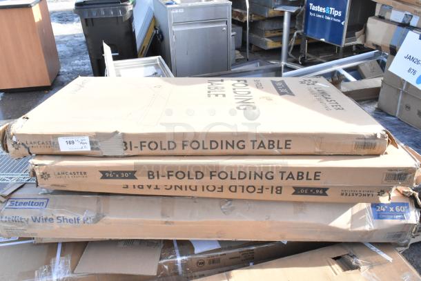 Boxes of 12 new Lancaster bi-fold tables and a Steelton utility wire shelf rack. Some packaging shows minor wear.