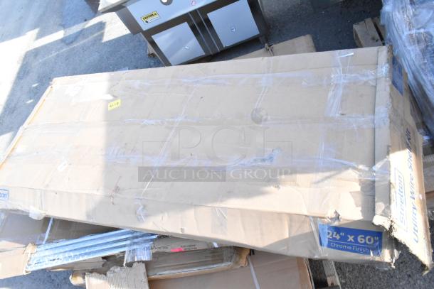 Cardboard box labeled "Steelton Utility Wire Shelf Kit 24x60 Chrome Finish" showing scratch and dent condition.