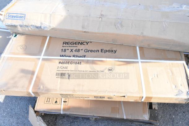 Cardboard boxes labeled "Regency" and "Steeltone" containing 18"x48" green epoxy wire shelves. New, scratch and dent condition.