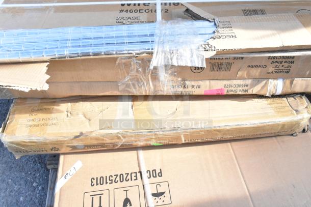 12 brand new items, including a wire shelf and bi-fold tables, in original packaging with visible scratches and dents. Markings show model #460EC1872, "Made in China."