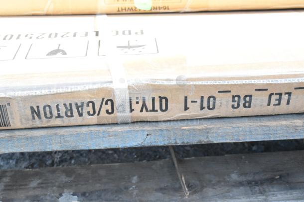 Cardboard box labeled "QTY-1" with protective straps, indicating scratch and dent items including wire shelf and bi-fold tables.