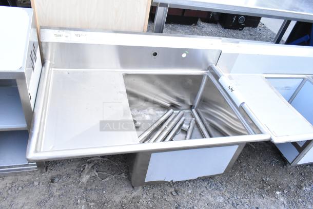 Stainless steel Regency 600S1242418L sink, single bay, left side drain board, NSF certified, scratch and dent condition.