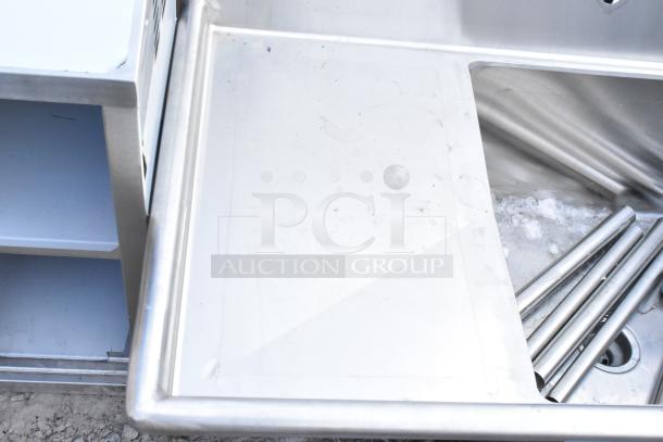 Brand new Regency 600S1242418L stainless steel single bay sink with left side drain board. Some visible scratches.