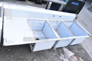 Brand new Regency 600S3182418L stainless steel 3 bay sink, left drain board, no legs, visible scratches and dents.