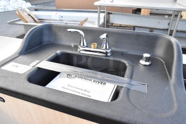 Brand new Ozark River ADSTM-AB-AB1N portable hot water hand sink, maple laminate cabinet, single basin, scratch and dent condition.
