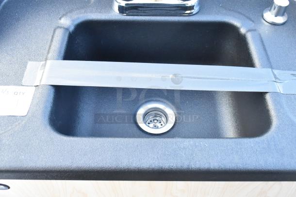 Brand new Ozark River ADSTM-AB-AB1N portable hot water hand sink with maple laminate cabinet, single basin, minor scratches.