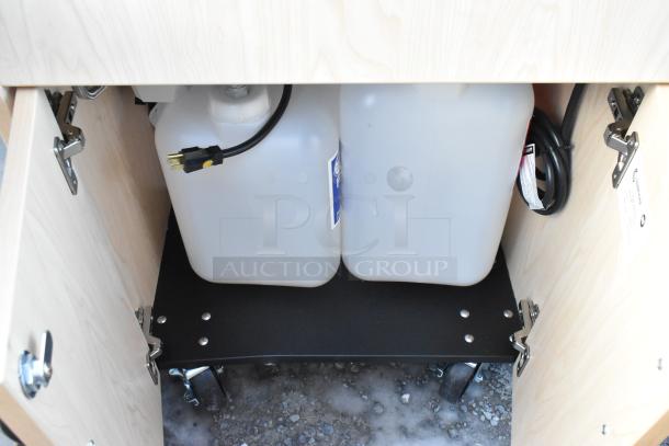 BRAND NEW Ozark River portable hand sink, maple laminate, single basin, visible tanks, and plug, scratch and dent condition.