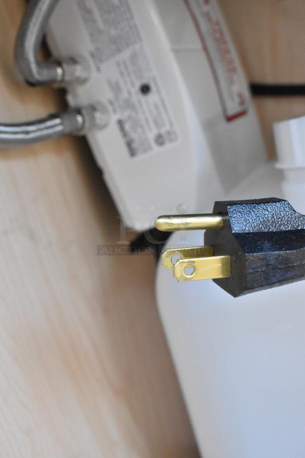 Alt text: Ozark River Premier Maple Portable Hot Water Hand Sink wiring and plug detail, showing power connection components.