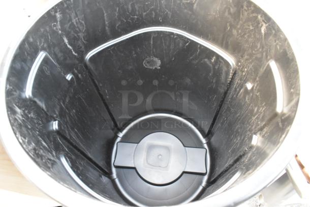 Rubbermaid® 1779739 BRUTE 55 Gallon Trash Can, black, executive model, brand new with visible scratches and dents.