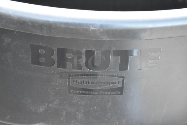 Rubbermaid BRUTE 55-gallon black trash can, new with scratches and dents. Features logo and durable design.