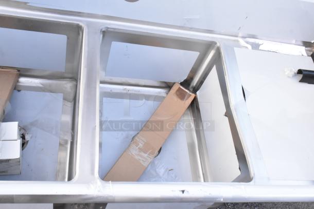 Stainless steel 2-bay sink with right drain board, new condition, minor scratches, by Regency, model 600S2162018R.