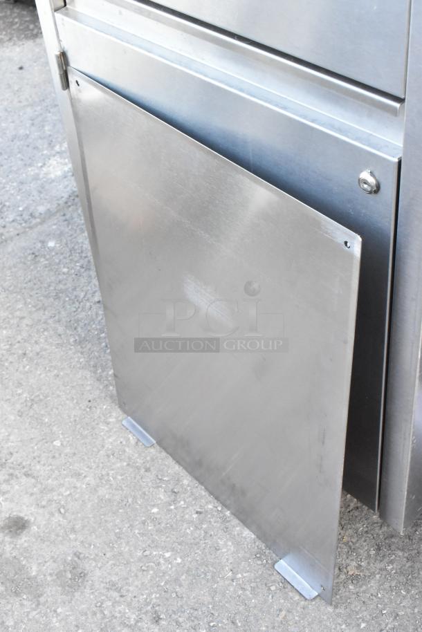 QualServ stainless steel portable sink with single bay, on commercial casters, in good condition.