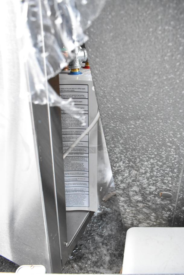 QualServ stainless steel single bay portable sink on commercial casters, visible instructions, minor wear shown.