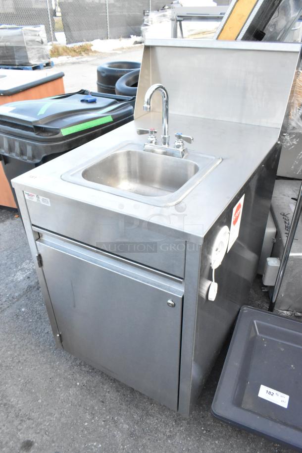 QualServ stainless steel commercial single bay portable sink on casters, excellent condition, with faucet, storage cabinet, and labels.