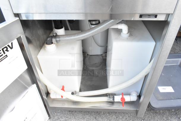 QualServ stainless steel portable sink, single bay, commercial casters, dual water tanks with hoses, visible QualServ label.