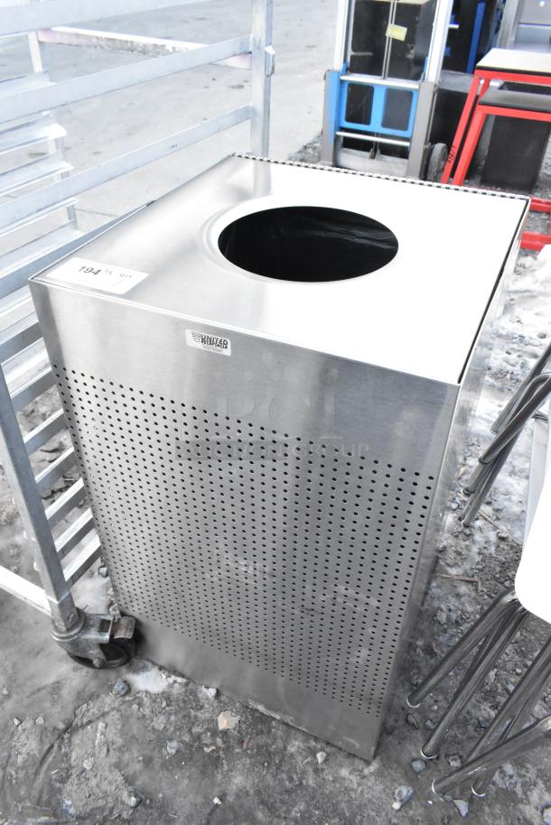 United Receptacle stainless steel trash can shell with perforated design, visible brand label, and top opening.