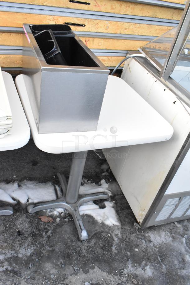 Three white dining height tables with metal baking pans and white poly lids. Good condition, ideal for restaurant use.