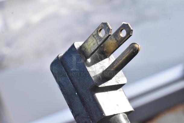 Power plug of a Commercial Floor Style Ice Cream Dipping Cabinet, 115 volts, 1 phase.