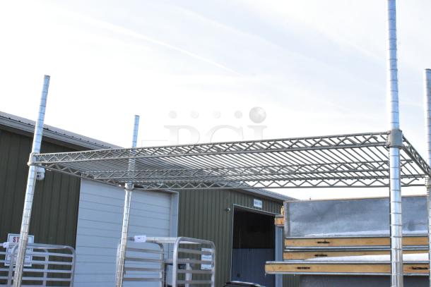 Chrome finish 4-tier wire shelving unit, sturdy and durable. Requires dismantling for transport. Consider freight costs.