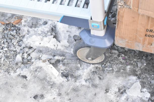 Metro Max 2 Tier wire shelving unit wheel and base, brand new with scratches and dents. Buyer must dismantle.