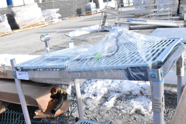 Brand new Metro Max 2 Tier Wire Shelving Unit, visible scratches, plastic wrapped, buyer must dismantle, freight charges apply.