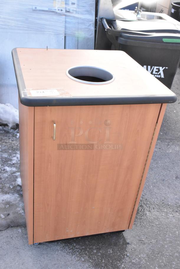 Wooden trash can shell with circular top opening, good condition, latch handle and labeled with item number.