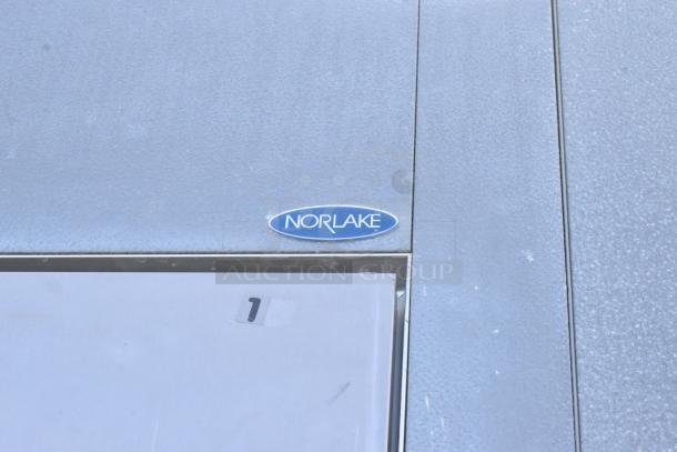 Norlake Walk In Freezer Box with blue logo, visible surface texture. Includes two evaporator fans. Signs of minimal wear.