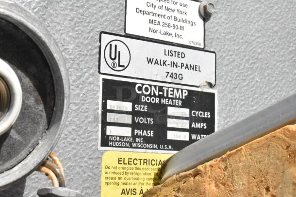 Norlake Walk In Freezer Box label showing UL listing and Con-Temp door heater details, including volts and amps.