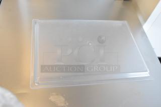 Brand new Cal-Mil 325-13-12 13" x 18" clear bakery tray with scratch and dent. Set of 4 trays, shallow design.