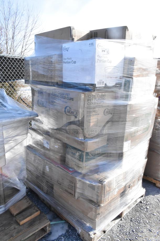Pallet with 33 boxes of new scratch and dent items, including popcorn bags, containers, and can liners, wrapped in plastic.