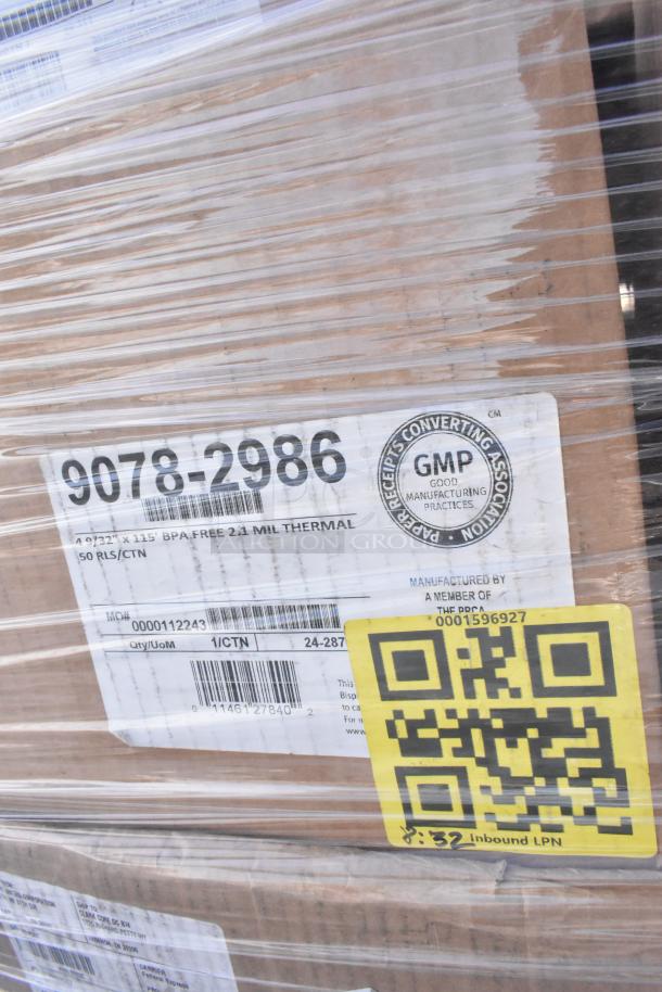 Palette-wrapped items with visible labels: "9078-2986," thermal paper product details, and a yellow QR code. Includes POS paper rolls.