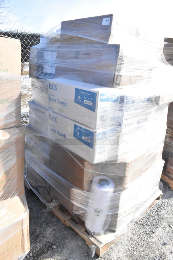 Pallet with 30 new scratch and dent items, including Lavex guest towels. Plastic wrap is visible.