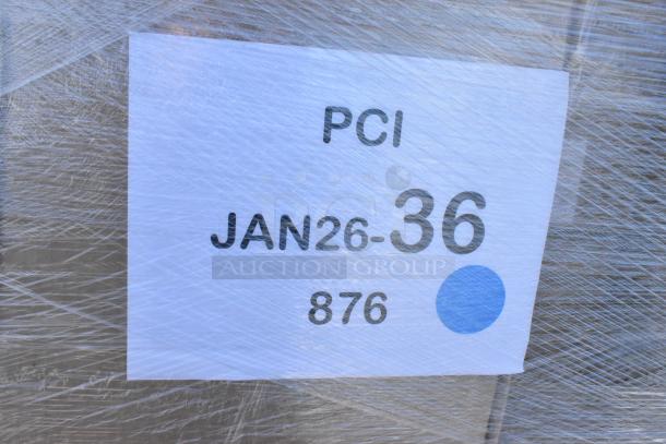 "Wrapped pallet showing a label with 'PCI JAN26-36 876' and a blue dot, indicating a lot of 34 new scratch and dent items ready for auction."