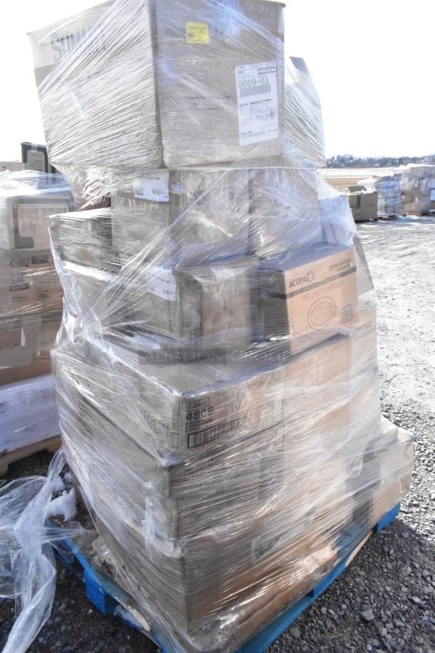 Pallet of 33 scratch and dent items, including tumblers, lab coats, glasses, plates. Boxes wrapped in clear plastic.